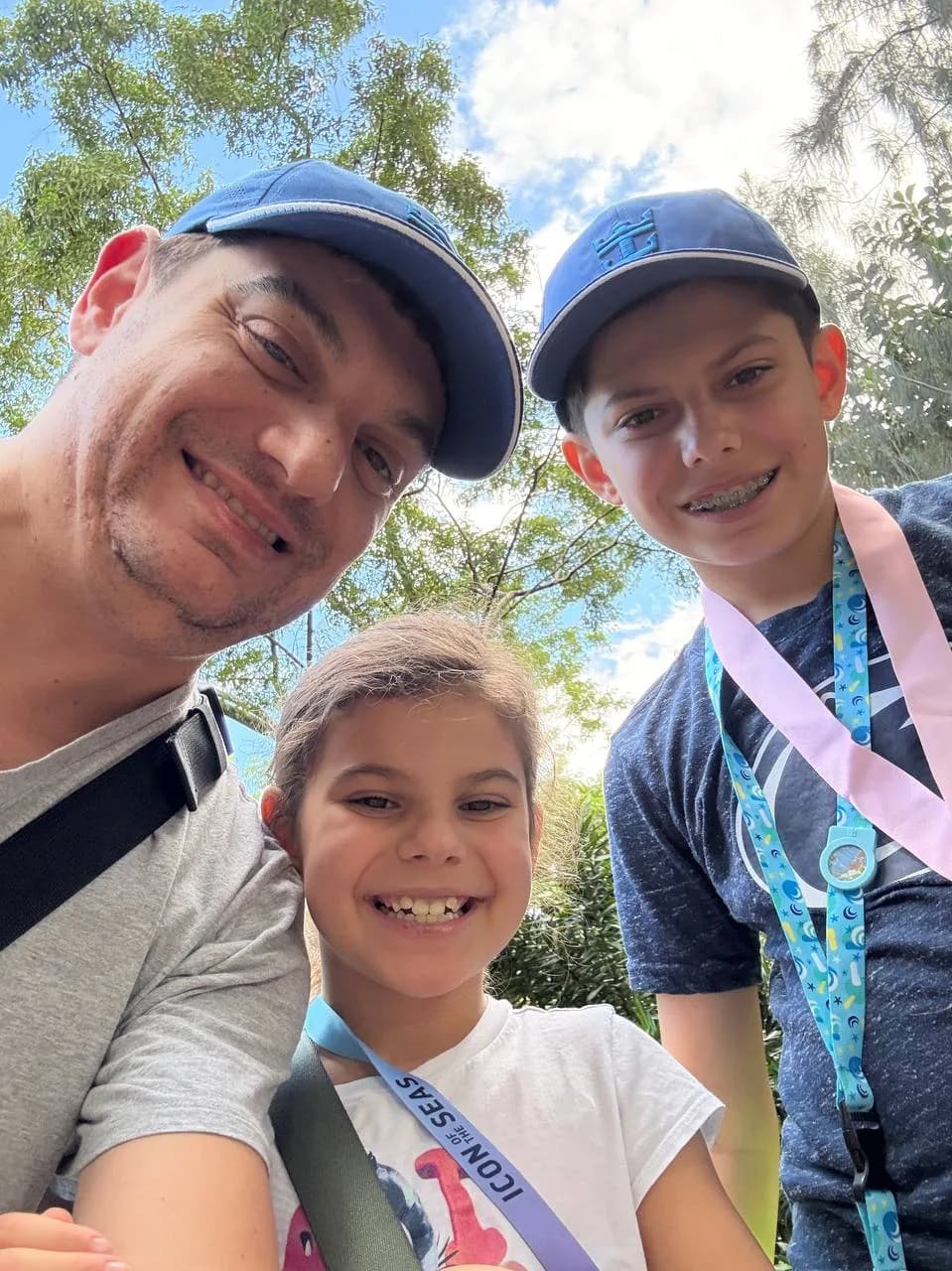 John with his two children on a family outing